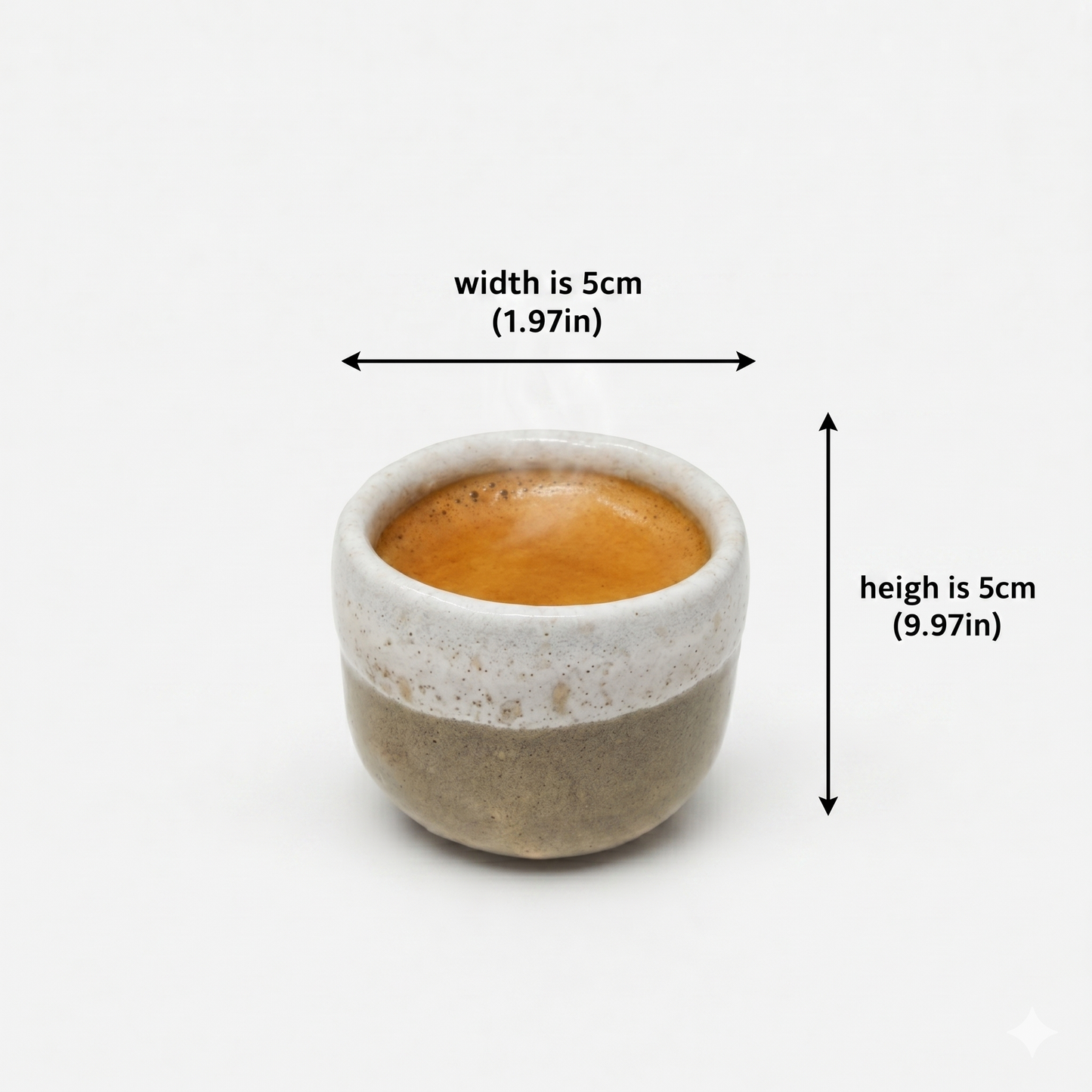 Small ceramic cup with espresso measurement details on a white background