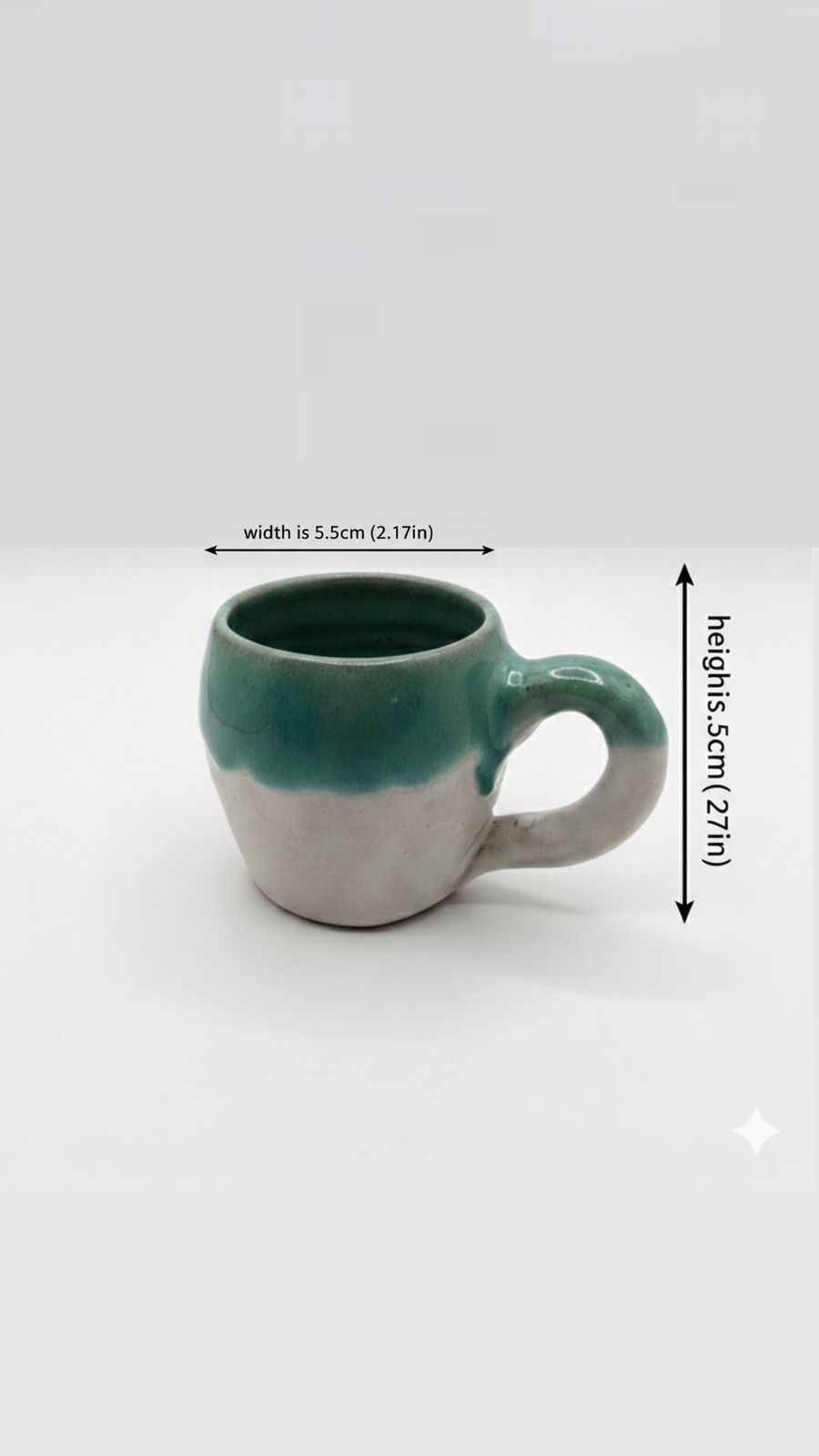 Green and white ceramic mug with measurements on a white background