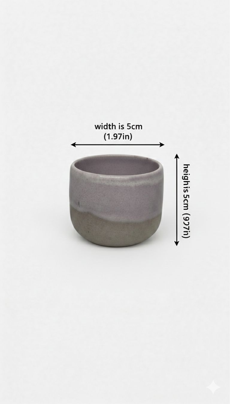 Gray ceramic cup with measurements on a white background