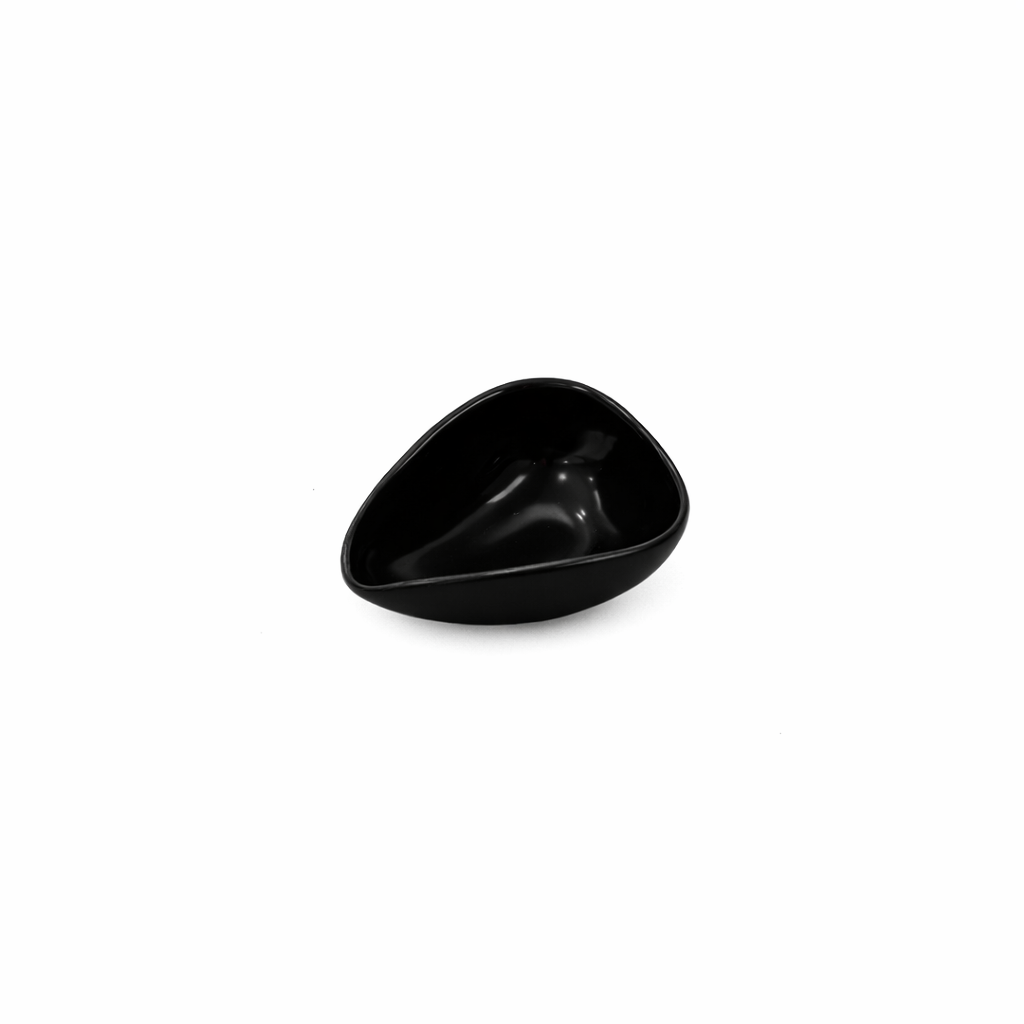 Black ceramic bowl on a white background