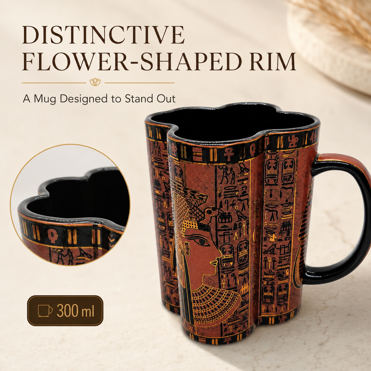 A flower-shaped ceramic mug with an Egyptian-themed design featuring hieroglyphs and a scarab beetle, shown on a light beige marble surface. The mug has a black interior and handle, and the design is primarily brown with gold accents.