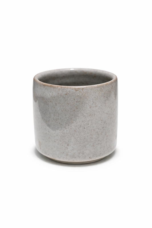 Gray ceramic cup on a white background