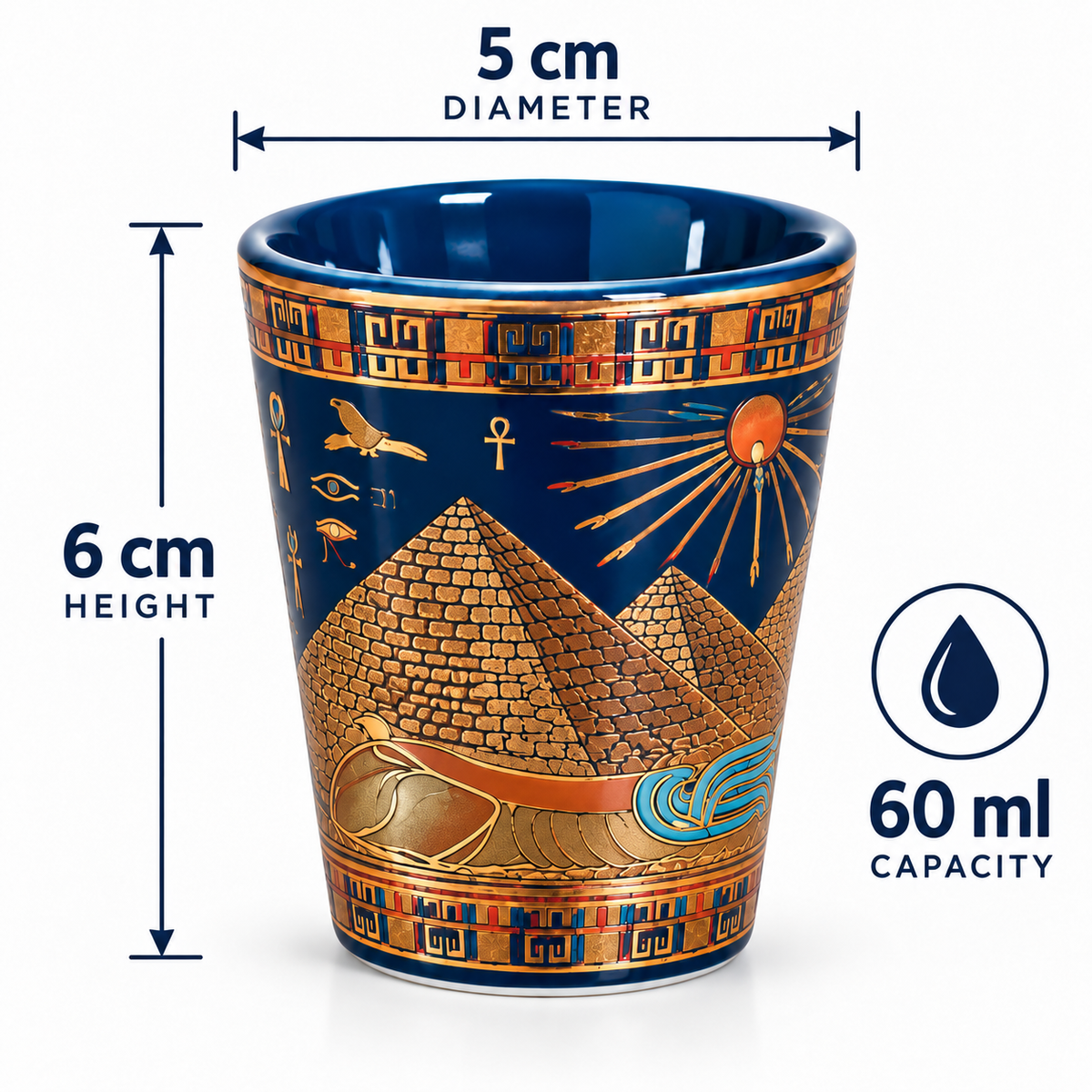 Egyptian-themed ceramic shot glass with a blue and gold design, showing dimensions of 5 cm diameter, 6 cm height, and 60 ml capacity on a white background.