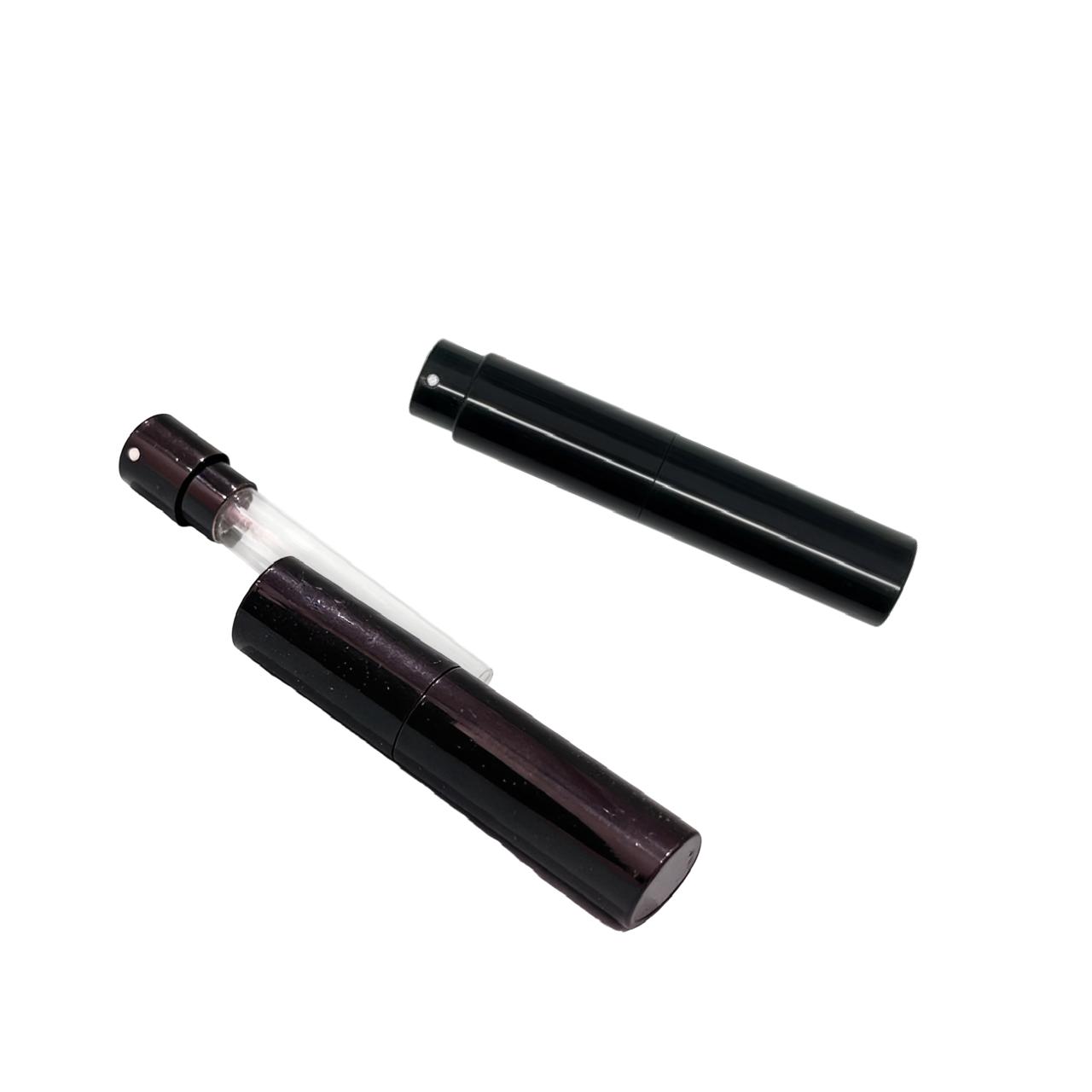 Two black cylindrical objects on a white background