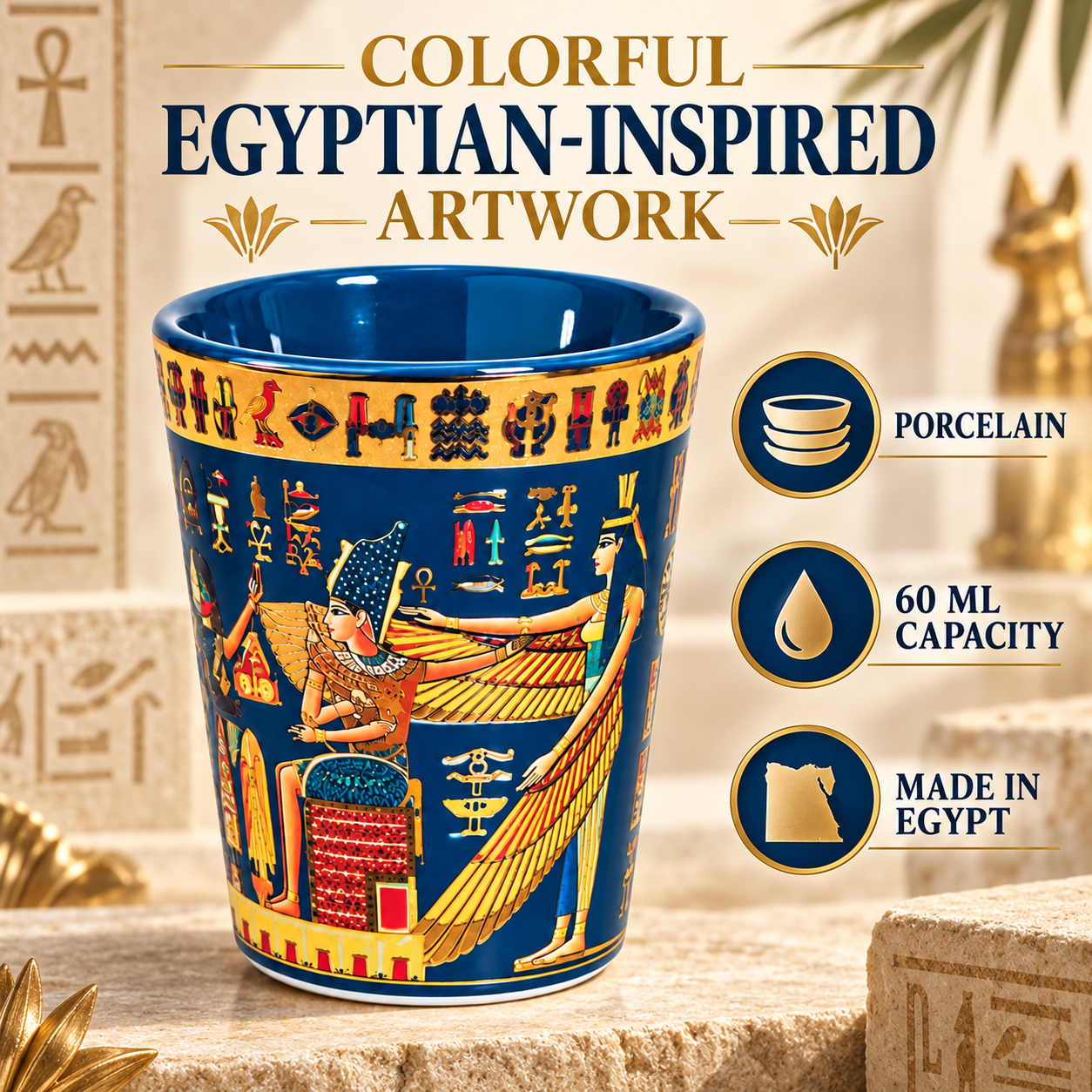 A blue and gold ceramic cup with Egyptian hieroglyphic artwork, shown on a stone surface with promotional text and icons reading 'Colorful Egyptian-Inspired Artwork,' 'Porcelain,' '60 ML Capacity,' and 'Made in Egypt.'.