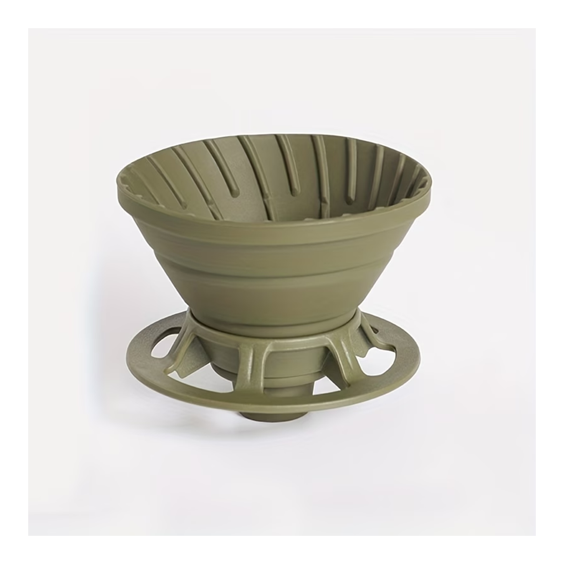 Green plastic coffee filter on a white background