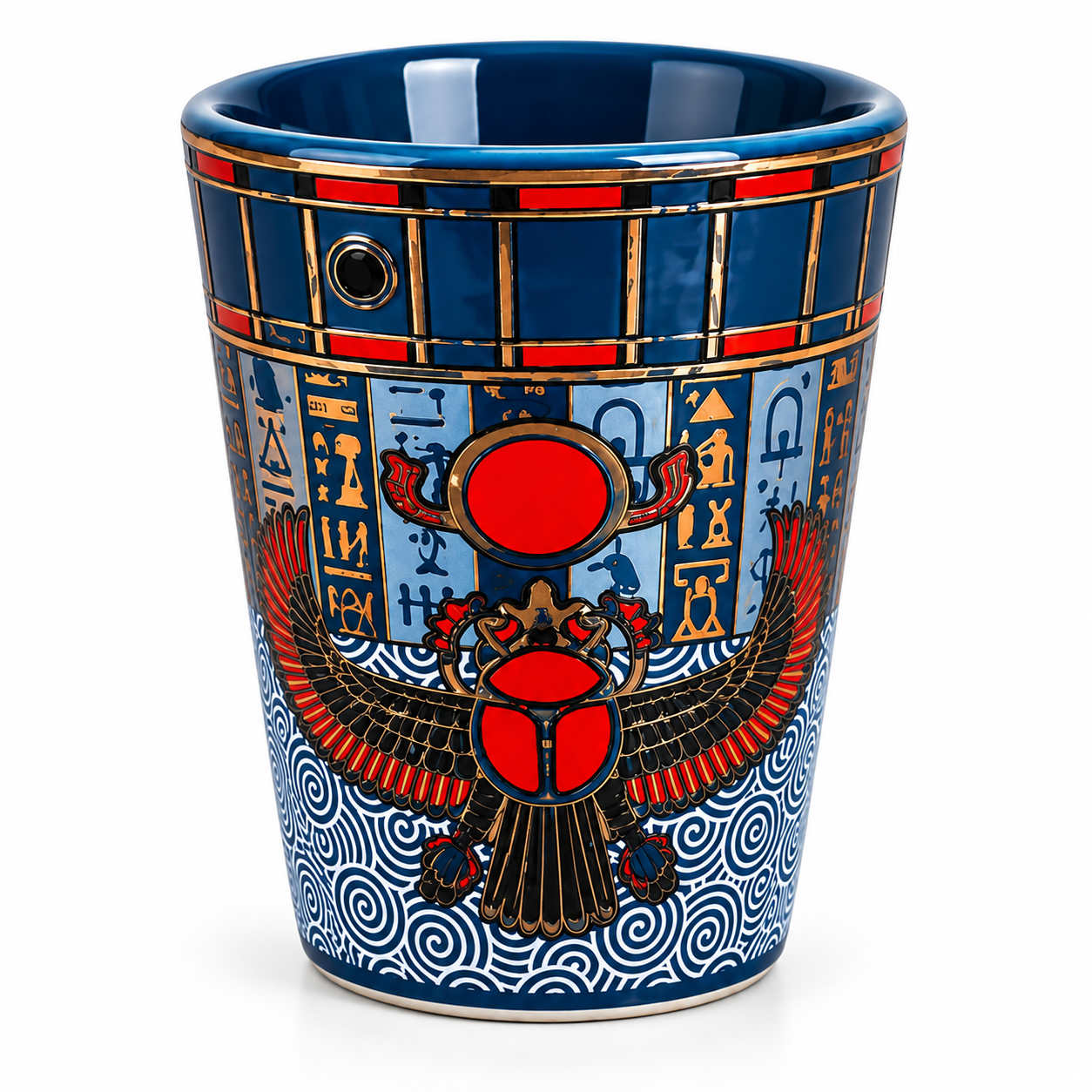 A ceramic cup featuring an Egyptian theme with a blue and gold background, hieroglyphs, a scarab beetle motif, and red accents, shown on a white background.