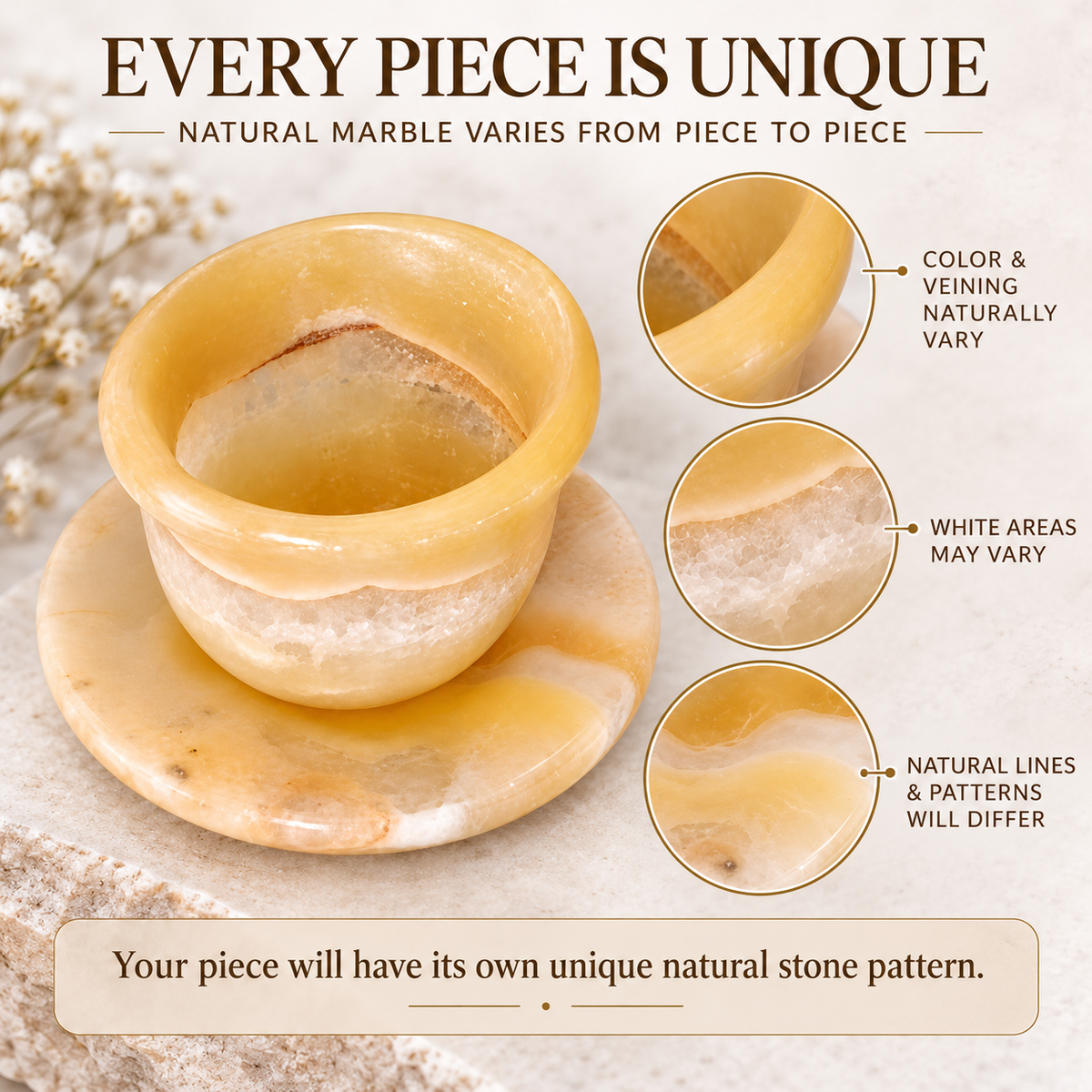 A polished natural stone cup and matching saucer in warm cream, tan, and honey tones, shown on a textured light surface with decorative dried flowers. Large text at the top reads 'EVERY PIECE IS UNIQUE' and includes callout circles explaining that natural marble varies in color and veining.