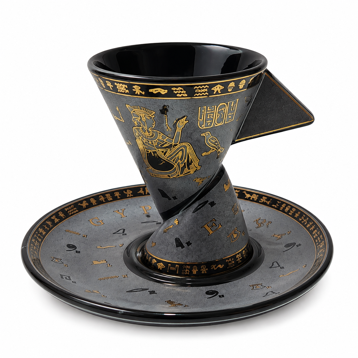 A black and gold ceramic pour-over coffee set with a matching saucer, featuring Egyptian-themed illustrations and hieroglyphic symbols.