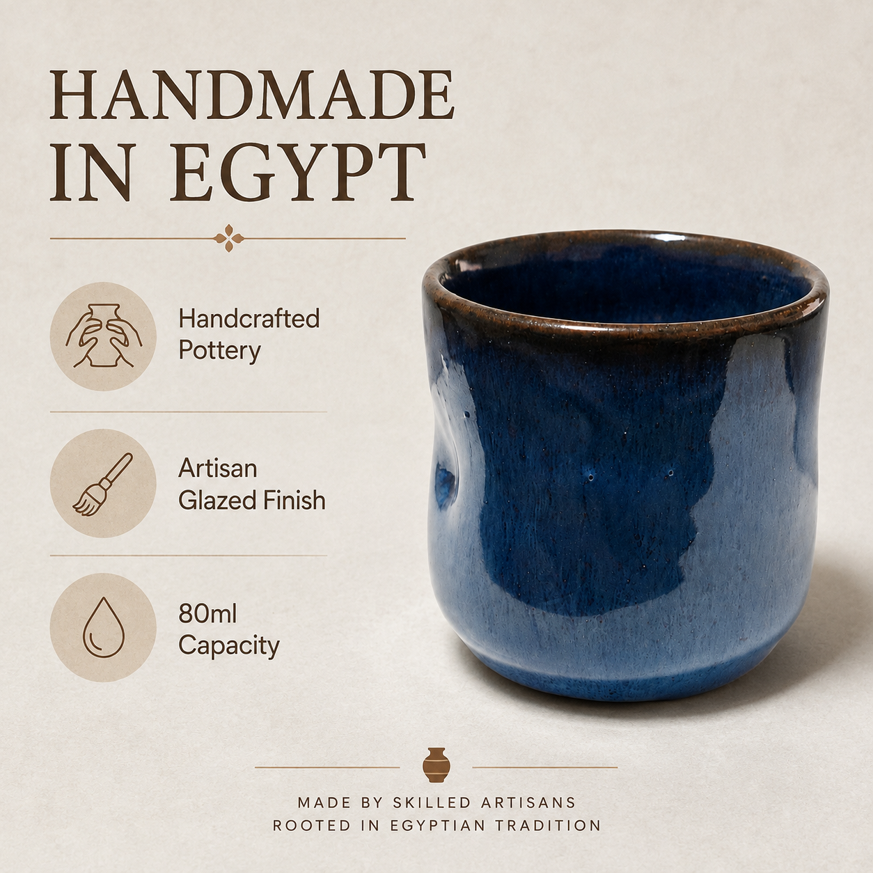 A handmade ceramic cup with a glossy dark blue glaze and a rustic brown rim, shown on a beige background with text highlighting handcrafted pottery, artisan glazed finish, and 80ml capacity.