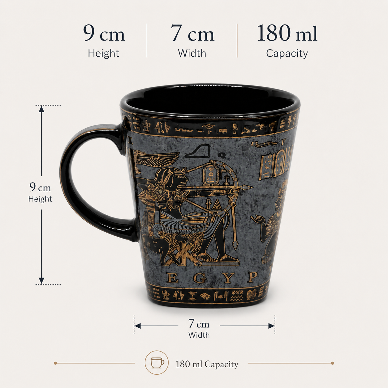A dark gray and black ceramic mug with gold Egyptian hieroglyphic designs, shown with dimension lines and text indicating its 9 cm height, 7 cm width, and 180 ml capacity.