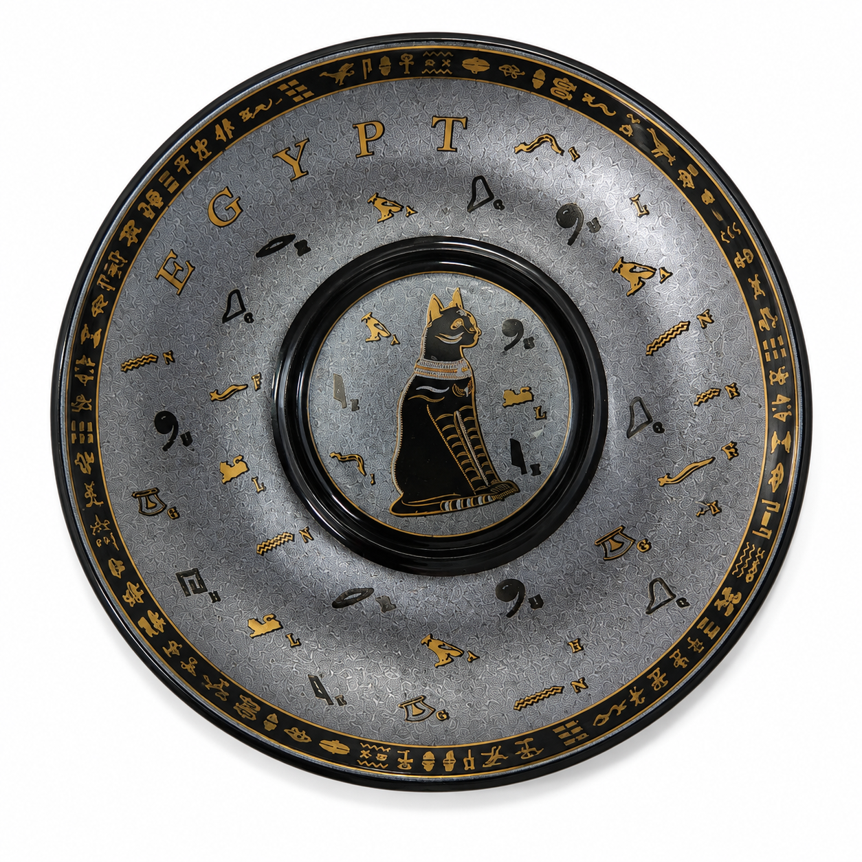 An Egyptian-themed round decorative plate or tray featuring a textured gray background with gold hieroglyphs, a central black cat figure, and the word 'EGYPT' around the rim.