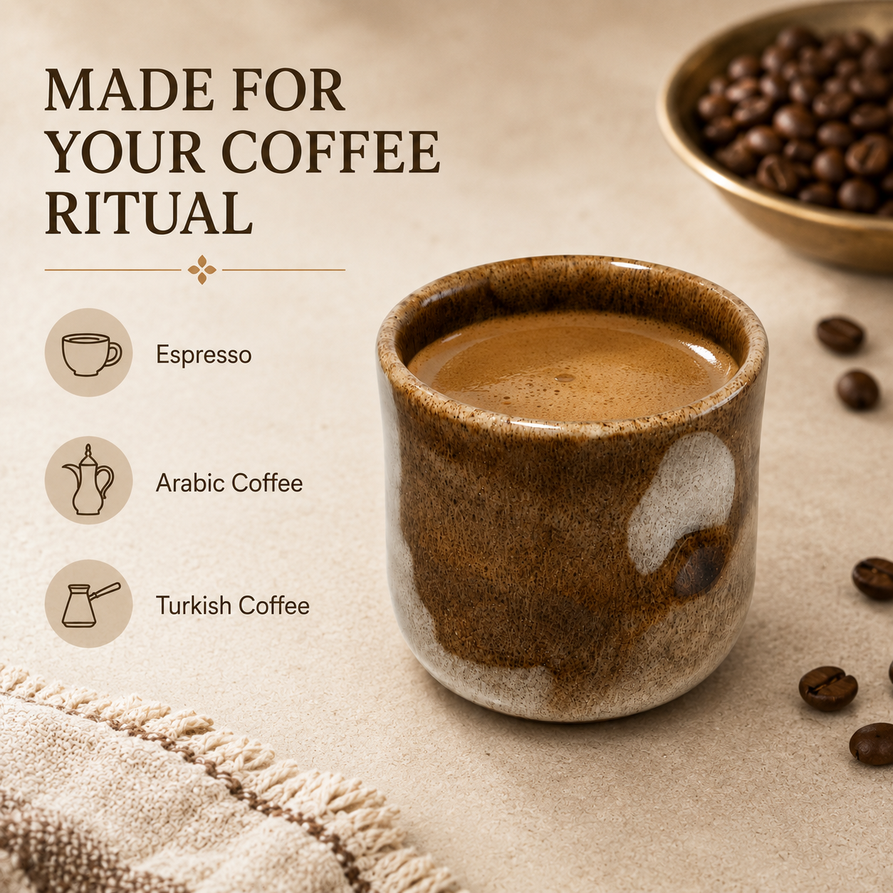 A ceramic coffee cup filled with espresso sits on a beige surface with scattered coffee beans, a bowl of whole beans in the upper right, and text reading 'MADE FOR YOUR COFFEE RITUAL' plus coffee types listed on the left.
