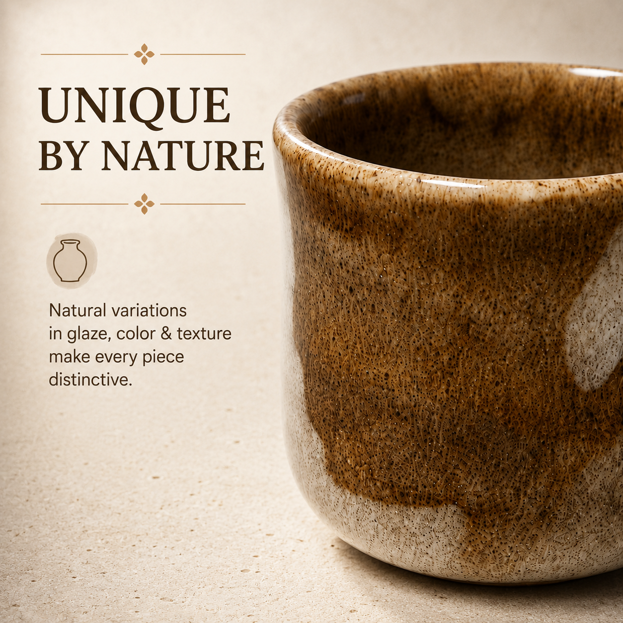 A close-up of a handmade ceramic cup with a rustic brown and beige glaze, set against a textured beige background with promotional text reading 'UNIQUE BY NATURE'.