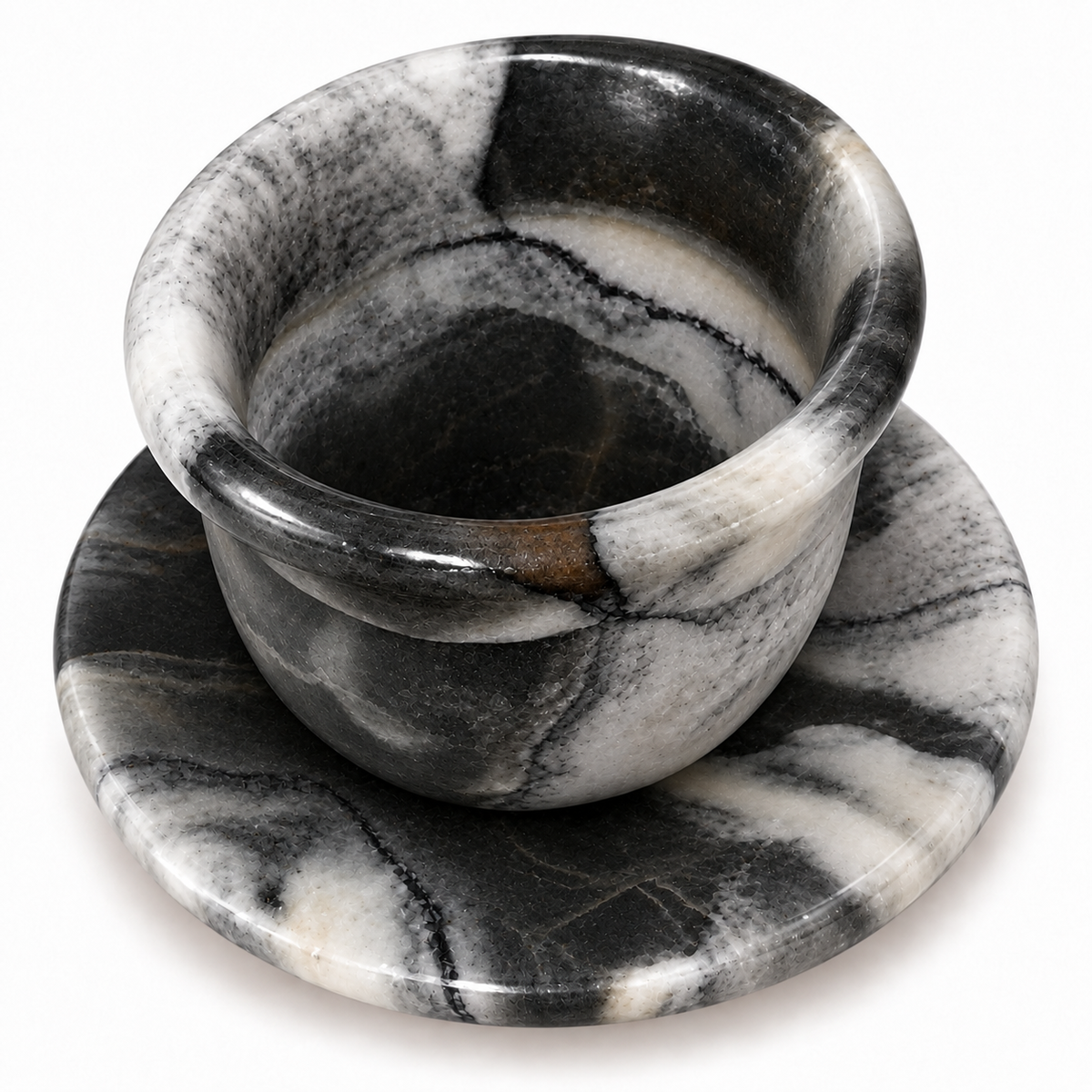 A black and white marbled stone cup with a matching saucer, photographed on a clean white background.