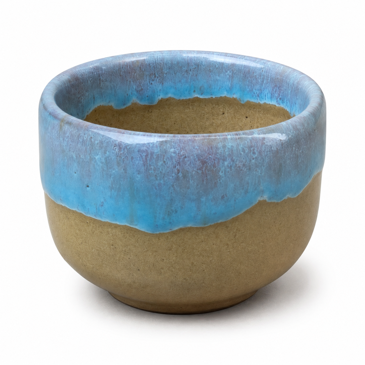 A handmade ceramic planter pot with a two-tone glaze design, featuring a vibrant blue glazed rim and a matte tan clay body, shown on a white background.