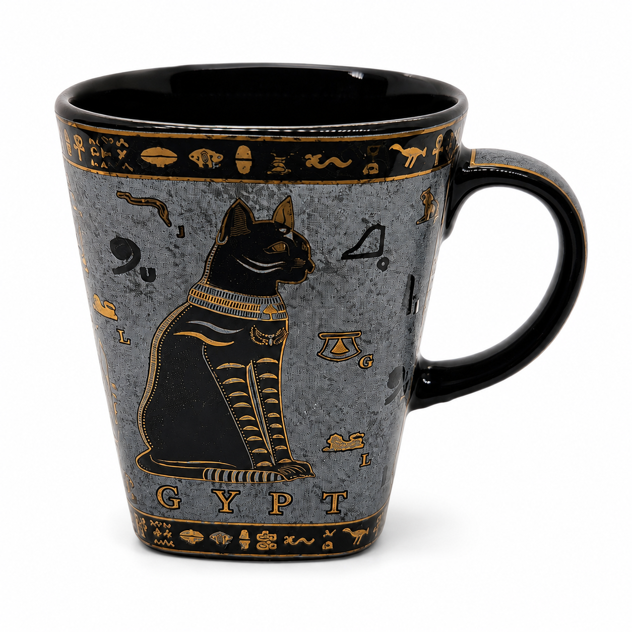 A ceramic mug with an Egyptian theme, featuring a black cat, hieroglyphs, and the word 'GYPT' on a textured gray background with a glossy black handle and interior.